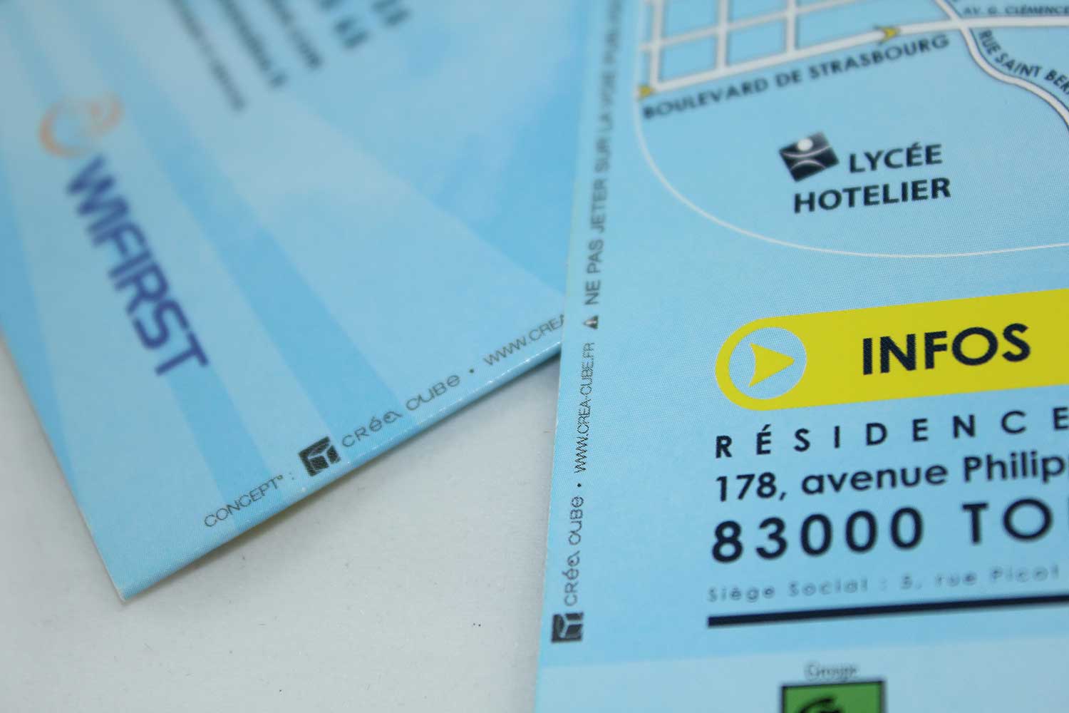Volet infos et coordonnées de la résidence, mention Crea Cube en pied de page